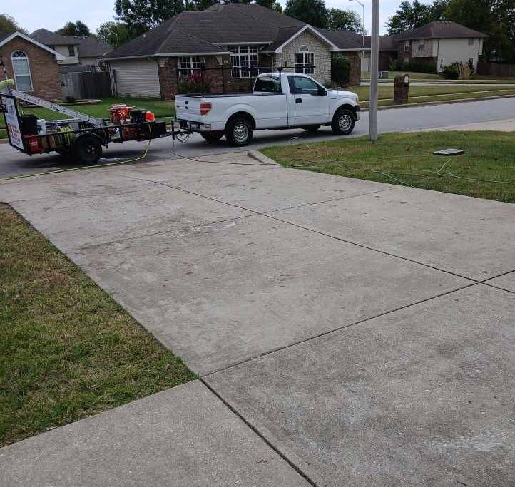 Clean driveway after pressure washing