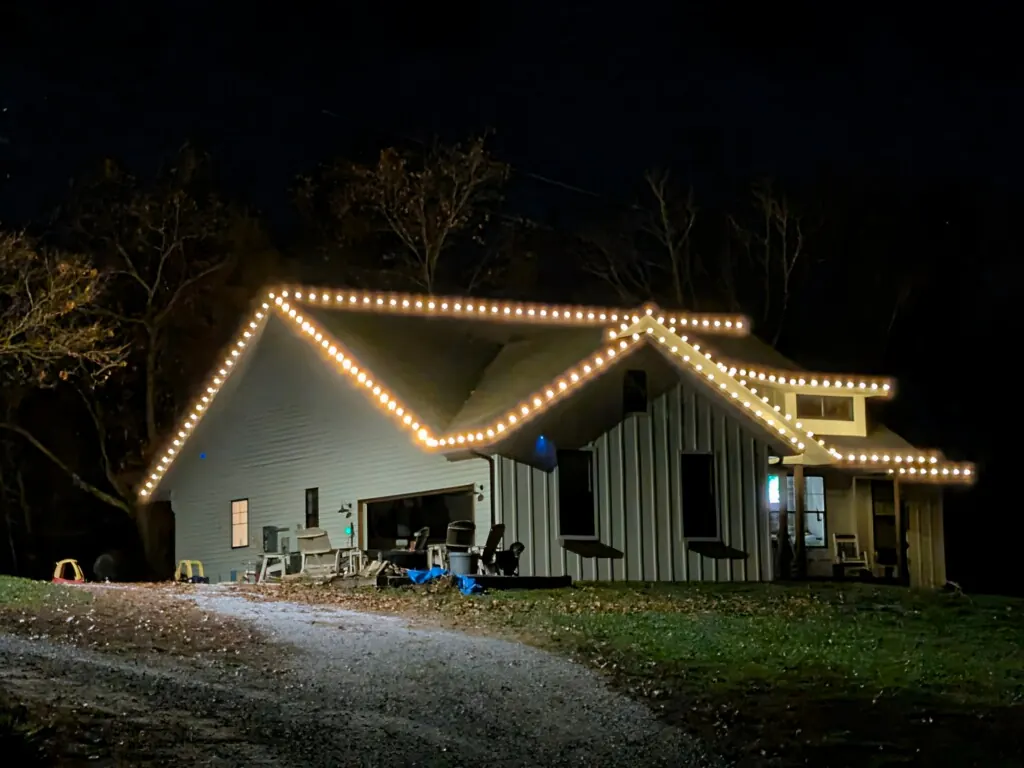 Warm architectural lighting on a cottage