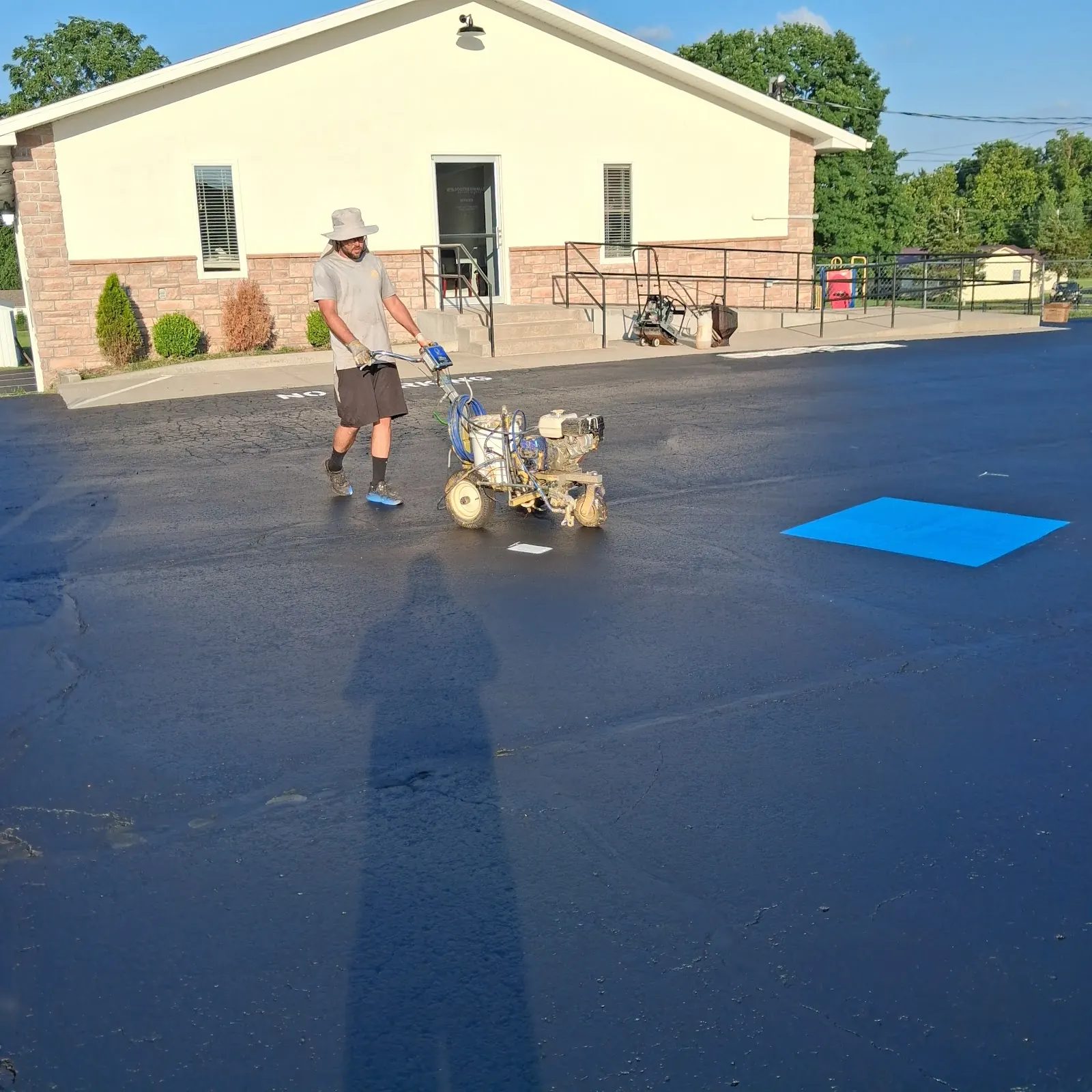 Reliable Pro crew working on a commercial parking lot